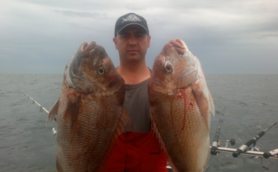 Nick with two snappers over 6kg each caught at the 18th annual snapper Classic