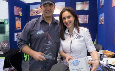 Eleni and Nick displaying the SAV EFF and Innovation Award at the Melbourne Boat Show
